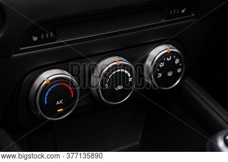 Close Up Instrument Automobile Panel With  Climat Control View With Air Conditioning Buttons- Detail