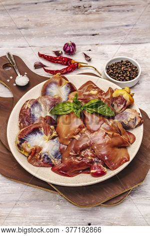 Fresh Raw Chicken Offal: Heart, Liver, Stomach With Dry Spices, Sea Salt, Chili Pepper On Wooden Tab