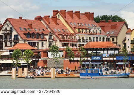Mikolajki, Poland, July 12: View To City From The Lake On July 12, 2020 At Mikolajki, Poland. Mikola