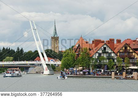 Mikolajki, Poland, July 12: View To City From The Lake On July 12, 2020 At Mikolajki, Poland. Mikola