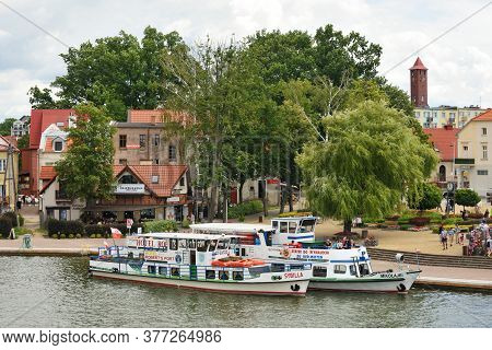 Mikolajki, Poland, July 12: Boats At Harbor On July 12, 2020 At Mikolajki, Poland. Mikolajki Is A Re
