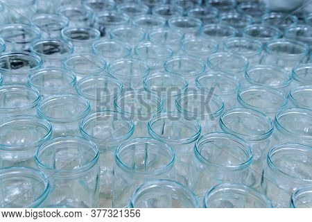 Glass Jar Empty Glasses Row For Jam Honey With Lid Caps Abstract Background