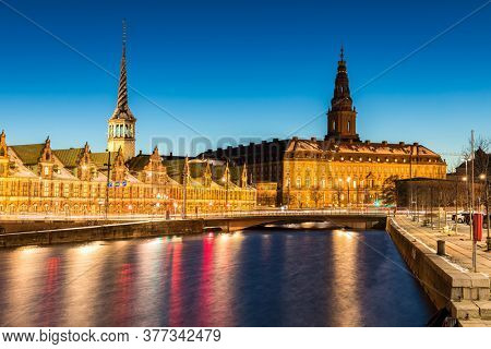 Copenhagen Cityscape with skyline skyscraper building downtown city at sunset twilight night Denmark Scandinavia in Europe. Landmark city life and nightlife concept.