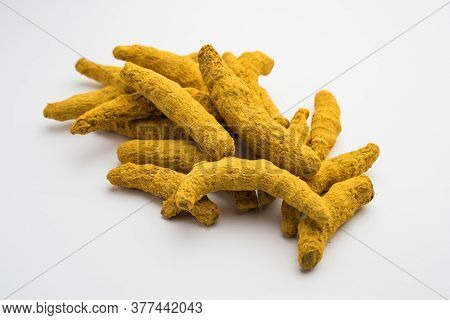 Haldi Or Dried Turmeric Roots As A Whole On White Background