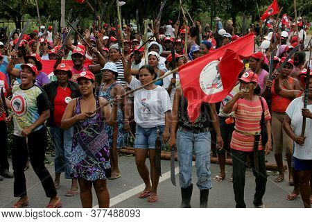 Eunapolis, Bahia / Brazil - March 1, 2011: Women From The Landless Movement Block Br 101 Highway In 