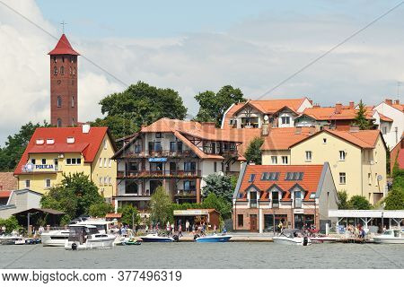 Mikolajki, Poland, July 12: View To City From The Lake On July 12, 2020 At Mikolajki, Poland. Mikola