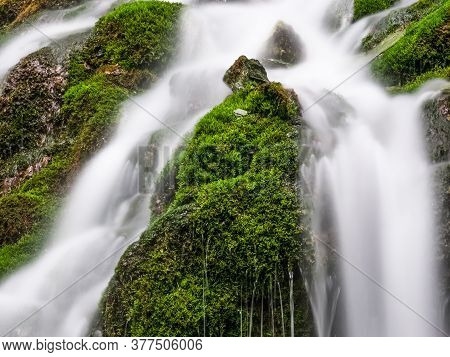 Foamy Valley Waterfall In Bucegi Mountains Accessible From Busteni Town. Long Exposure Picture Of A 