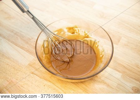 Whisking A Dalgona Latte Coffee Cream On A Bowl. Homemade Dalgona Coffee.