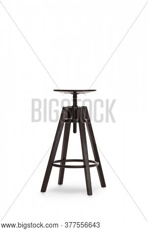 Studio shot of a three legged black chair isolated on white background