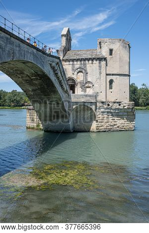 Avignon, France - July 7, 2020: The Pont Saint-benezet Also Known As The Pont Avignon Is A Famous Me