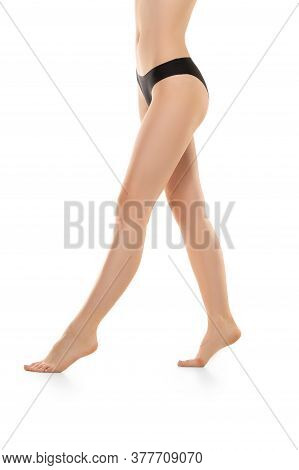 Beautiful Female Legs, Buttlocks And Belly Isolated On White Background. Beauty, Cosmetics, Spa, Dep