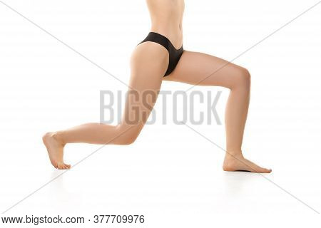 Beautiful Female Legs, Buttlocks During Sport Isolated On White Background. Beauty, Cosmetics, Spa, 