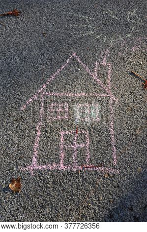 Chalk Drawn Pink House On The Street With Yellow Sun, Symbol For Living, Residing, Home