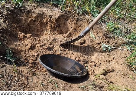 A Plate For Rinsing Rock In Search Of Gold.
