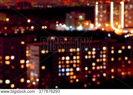 Commuter Town In Night Lights. Blured. Moscow Region, Russia.