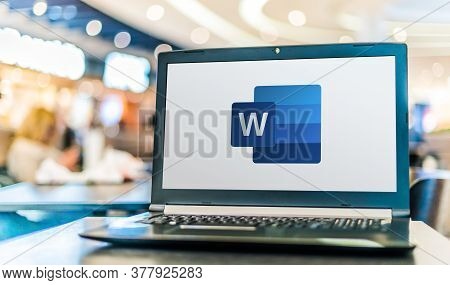 Poznan, Pol - Apr 28, 2020: Laptop Computer Displaying Logo Of Microsoft Word, A Word Processor Deve