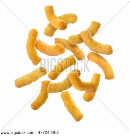 Many Tasty Corn Sticks Falling On White Background
