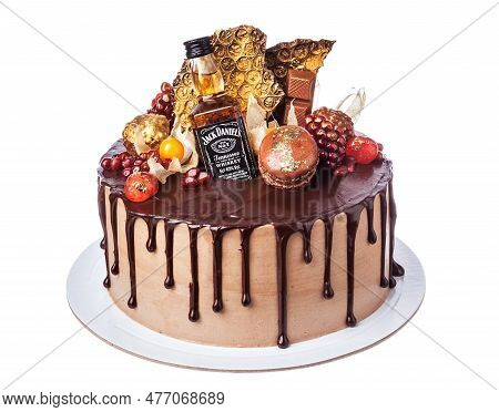 Cake Decorative Colorful Cake Decorated With Fruits And A Bottle Of Jack Daniels Whiskey. On A White