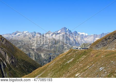Panorama View With Mountain Finsteraarhorn And Furka Pass Road In The Swiss Alps, Switzerland