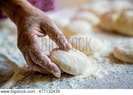 Hands Pie Dough. Cooks Doughs For Baking, Pieces Of Raw Dough. Womans Hands Rolling Dough For Pies. 
