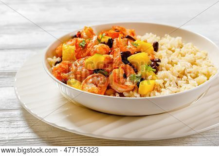 Caribbean Grilled Shrimps With Black Beans, Mango Pineapple Salsa Served With Brown Rice In White Bo