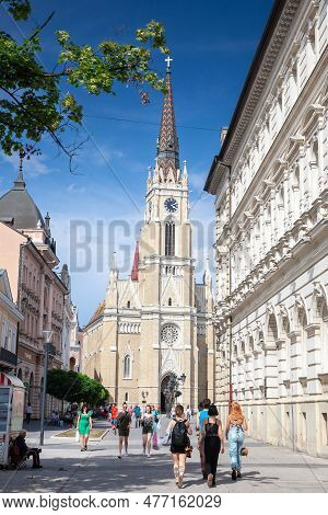 Novi Sad, Serbia - June 25, 2022: Group Of Young Women, Girls, Walking By The Name Of Mary Church, O