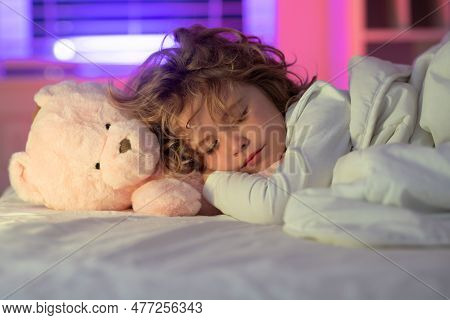 Calm Kids Sleep. Child Boy Sleep With A Toy Teddy Bear, Napping. Kid Sleeping In Bed.