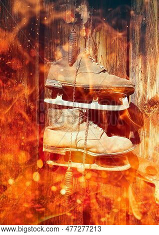 Antique Old Style Retro Object Assemblage On A Wooden Wall, Rustic Stile. Old Skates. Fire Effect.