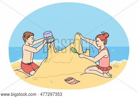 Happy Children Building Sand Castle On Beach On Summer Holidays. Smiling Little Kids Play With Sandc