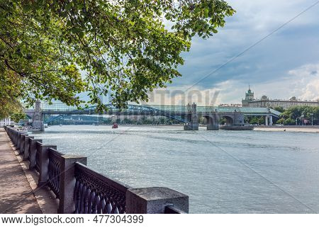 View Of The Moscow River Embakment, Pushkinsky Bridge And Cruise Ships At Sunset. Wide Moskva River,