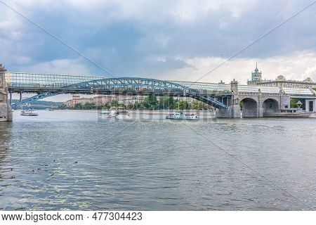View Of The Moscow River Embakment, Pushkinsky Bridge And Cruise Ships At Sunset. Wide Moskva River,