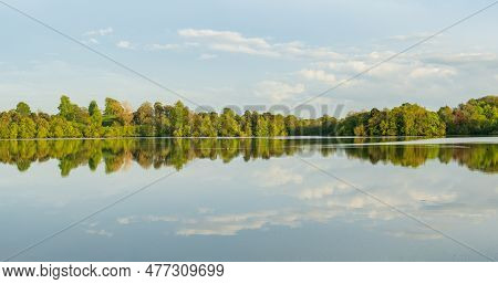 Panorama Of The Lake Shore Of The Mere With A Perfect Lake Reflection In Ellesmere In Shropshire