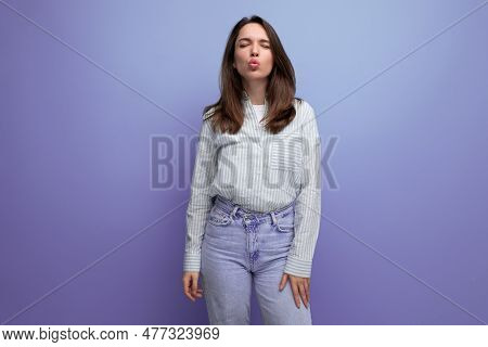 Joyful 25 Year Old Brown-haired Woman With Well-groomed Silky Hair After Hairdresser Work