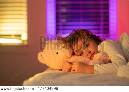 Drowsy Kid In Bed With Comfortable Mattress Soft Pillow White Bedding. Kid Asleep Cover Blanket. Goo