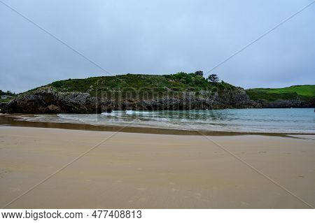 View On Playa De Borizo In Celorio, Green Coast Of Asturias, North Spain With Sandy Beaches, Cliffs,
