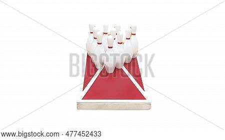 Bowling Pins On Top Of A Cornhole Game Board With A White Background.