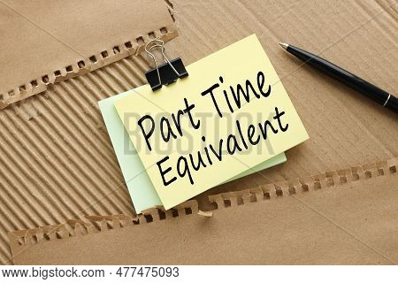 Pte Part Time Equivalent Symbol. Text On Yellow Sticky Note On Brown Background. Business Concept.