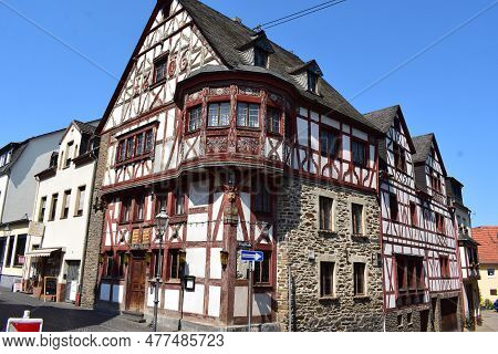 Rhens, Germany - 06 05 2023: Half-timbered Building With A Stone Wall