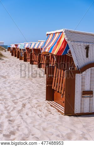 Cosy Beach Chairs Waiting For Guests At The Beach In Kuehlungsborn At The Baltic Sea