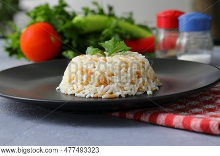 Traditional Turkish Rice Pilav. Plain Pilaf Portion Served. Organic Food. Turkish Style Rice Pilaf (