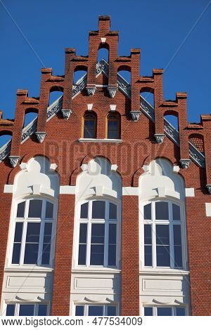 The Gable Wall Of The Building Is In The Neo-gothic Style With Large Windows.
