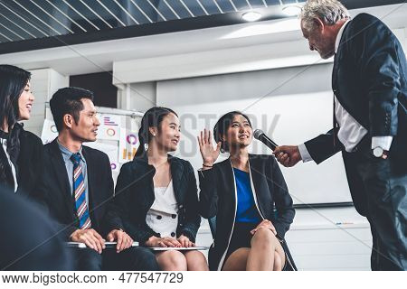 Senior Leader Speaker Speaks To Public People Audience In Training Workshop Or Conference. Mature Le