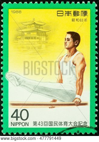 Blagoevgrad, Bulgaria - May 30, 2023: Postage Stamp Printed In Japan Shows Gymnast Performs An Exerc