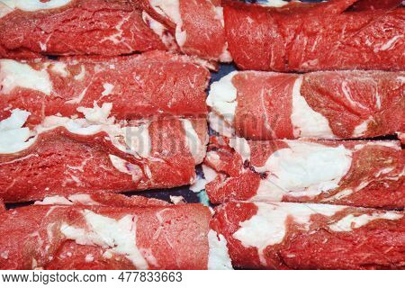 Raw Frozen Beef Meat Slice Roll Ingredient Food On Plastic Tray In White Background