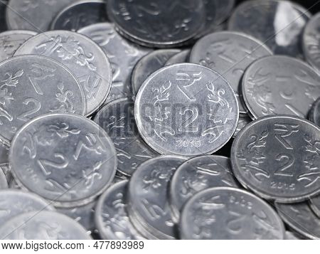 Closeup Of A Collection Of Indian 2 ( Two ) Rupee Coins Made Of Silver In A Mixed Up Pile