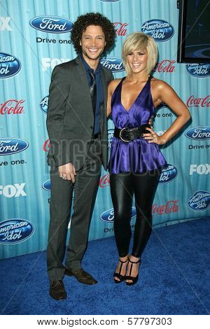 Justin Guarini and Kimberly Caldwell at the 'American Idol' Top 12 Party. Area, Los Angeles, CA. 03-05-09
