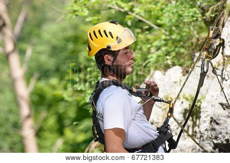 Steeplejack Climbing A Rock Wall