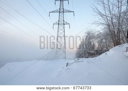 Fog At The Winter Near The Electric Wires