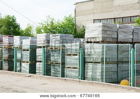 Packed Cinder Blocks Outdoors In Racks