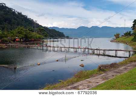 Bridge With Fishermen On Lake Maninjau